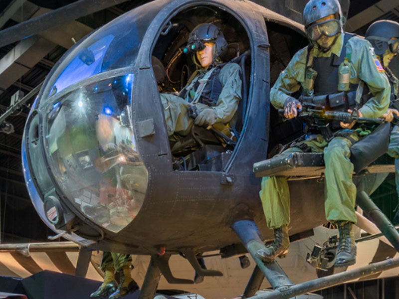 A museum exhibit of Soldiers in aircaft vehicle inside the Airborne and Special Operations Museum.